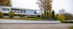 NaturOase, Moderne Architektur - Arbeitsplatz - Terrasse - Parkplatz - Waschmaschine